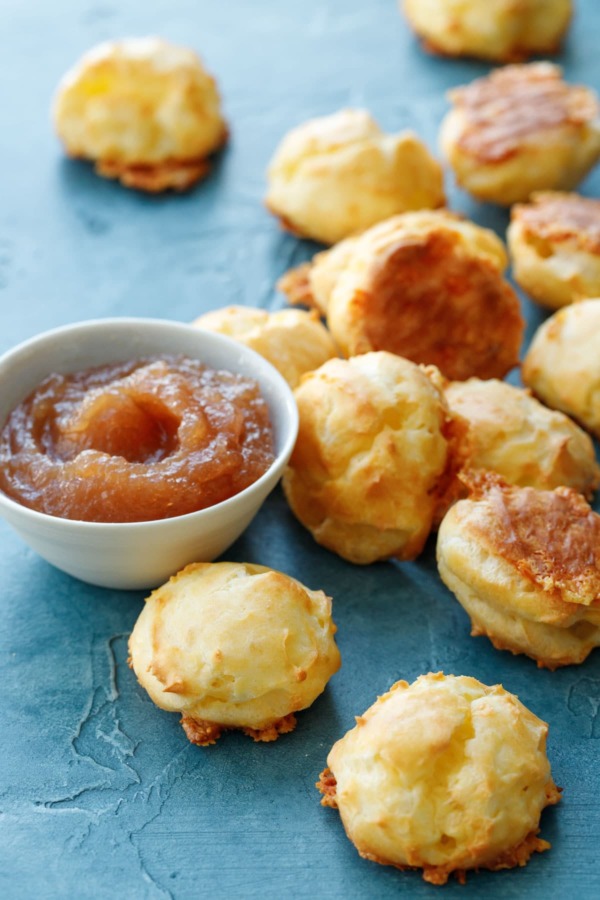 white cheddar gougères with apple butter