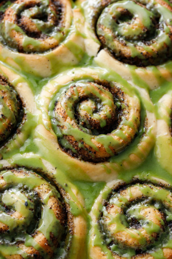 Close up of Black Sesame Cinnamon Rolls with Matcha Glaze