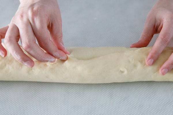 Pinch the seam to hold the dough together.