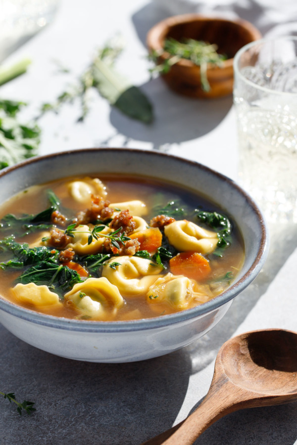 Big bowl of Tortellini Kale Soup with Italian Sausage