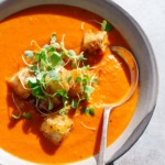 The Best Tomato Soup using canned tomatoes, topped with cheesy croutons!