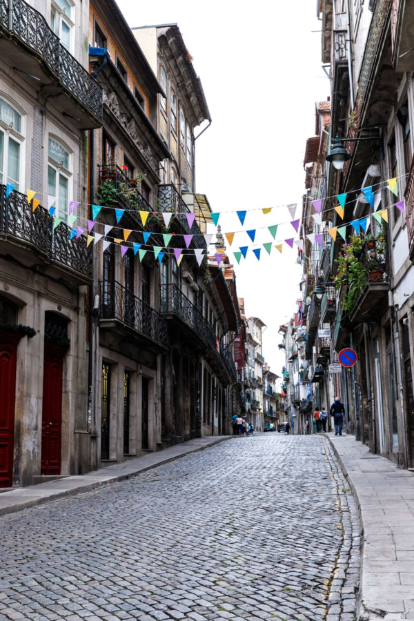 Cobbled street and colorful bunting, Porto, Portugal