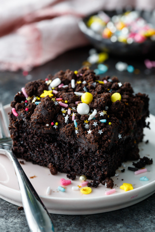 This Blackout Sheet Cake is ultra dark, complete with a chocolate glaze and crunchy cookie crumbs on top!