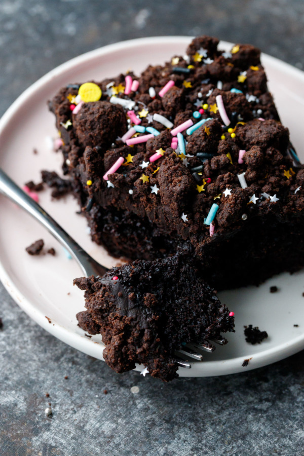 Blackout Sheet Cake is darker than dark chocolate, super moist and topped with a rich chocolate glaze and homemade cookie crumbs!