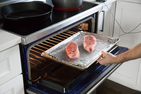 How to Cook Reverse-Sear Steaks: bake in a low-temperature oven until the steaks reach your desired temperature.