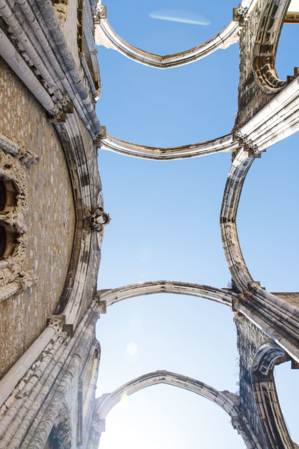 Looking up at the salvaged arches in the Carmo Convent in Lisbon, Portugal