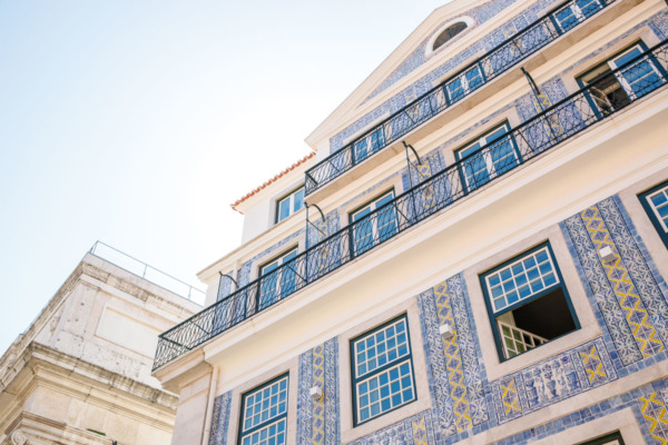 Beautiful blue and white tiled building facade in Lisbon, Portugal