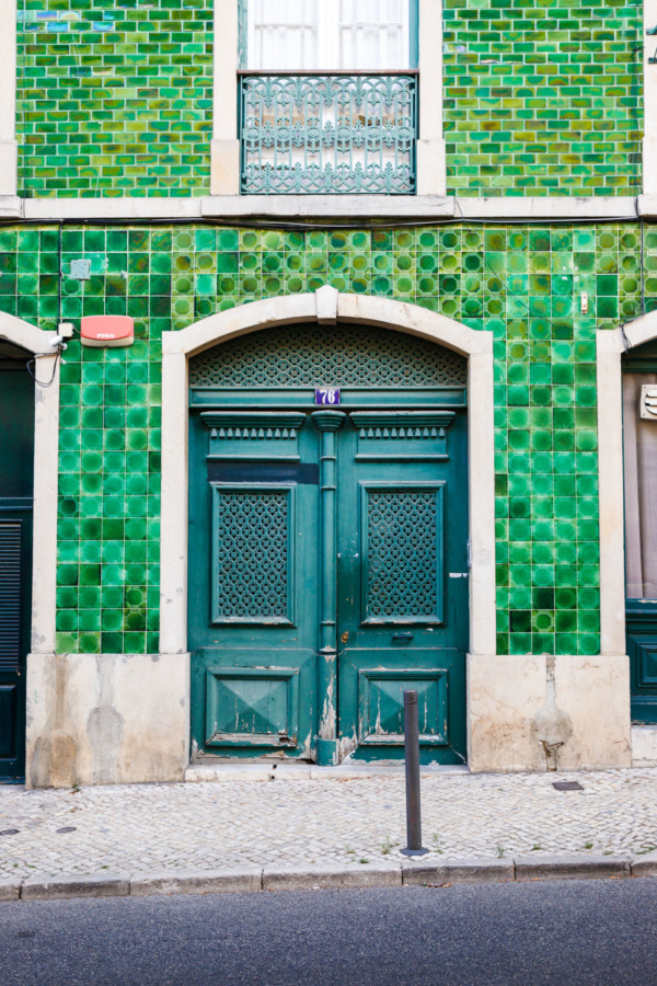 Green tiled facade in the Barrio Alto district of Lisbon, Portugal