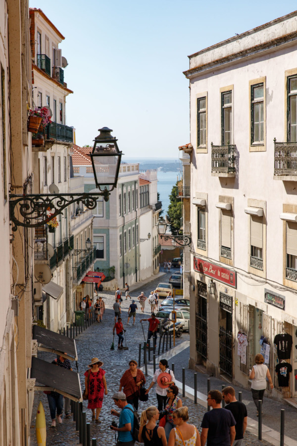 Looking down a hilly street in Lisbon, Portugal