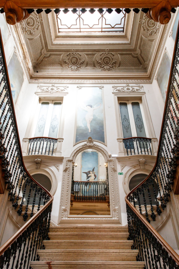 The grand staircase inside Embaixada, a former Arabian palace-turned-shopping gallery in Lisbon, Portugal