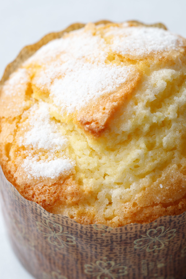 Extreme closeup of the sugary crust that develops on top of the Portuguese rice muffins as they bake.