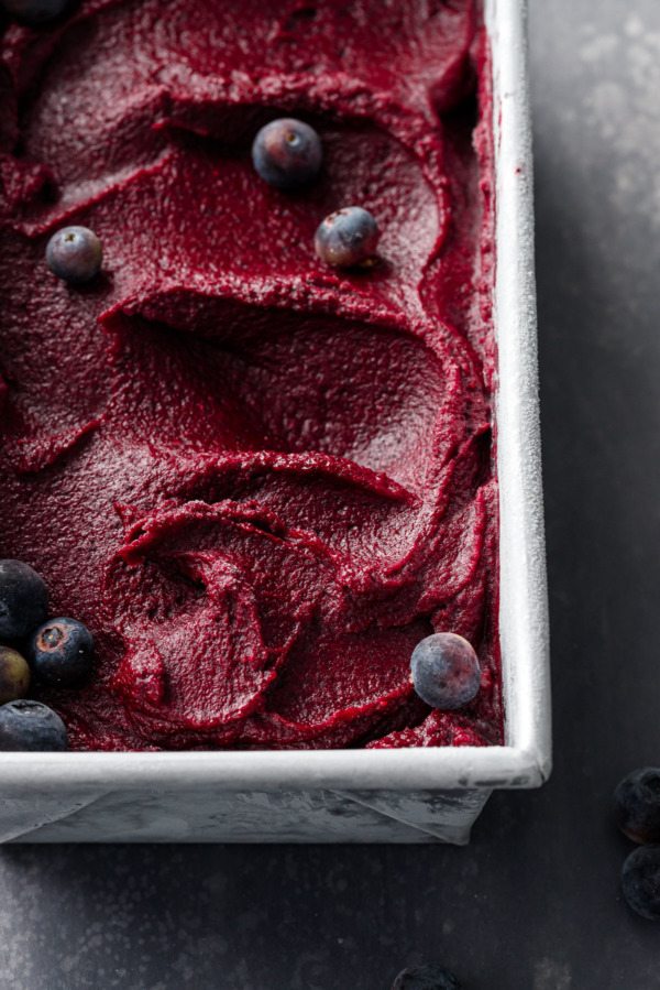 Closeup of Blueberry Ginger Sorbet frozen in a metal loaf pan