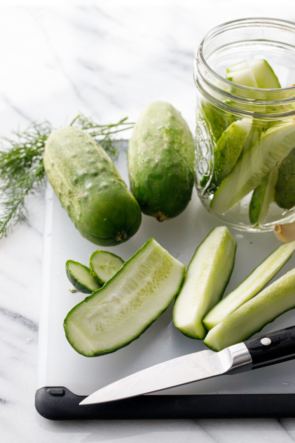 Cutting Kirby cucumbers into spears to make refrigerator pickles
