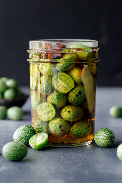 Jar full of cucamelon pickles, ready to be refrigerated.