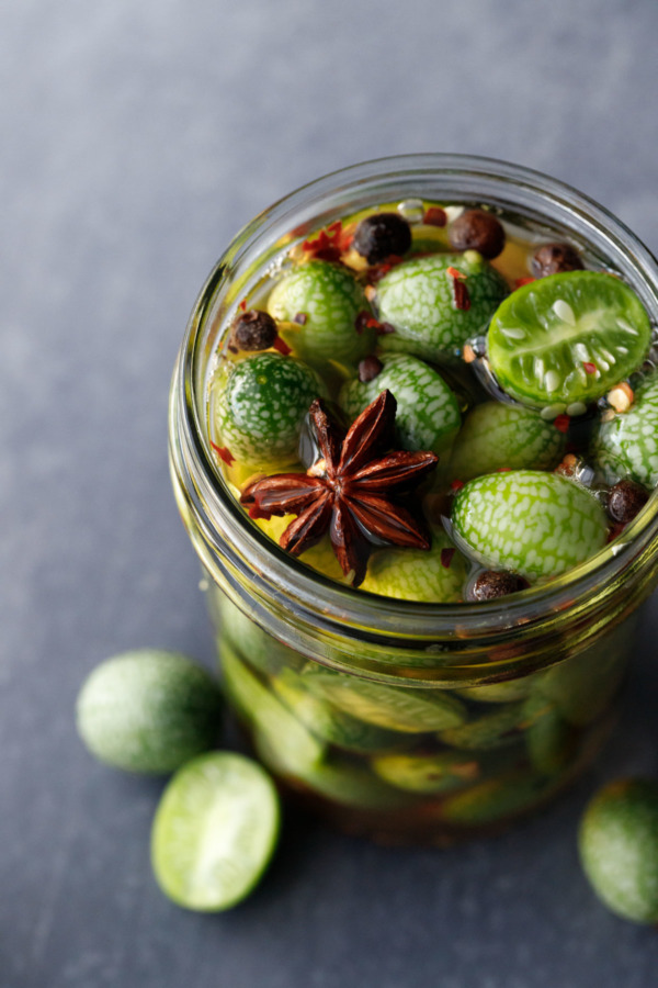 Jar full of cucamelon pickles, ready to be refrigerated.