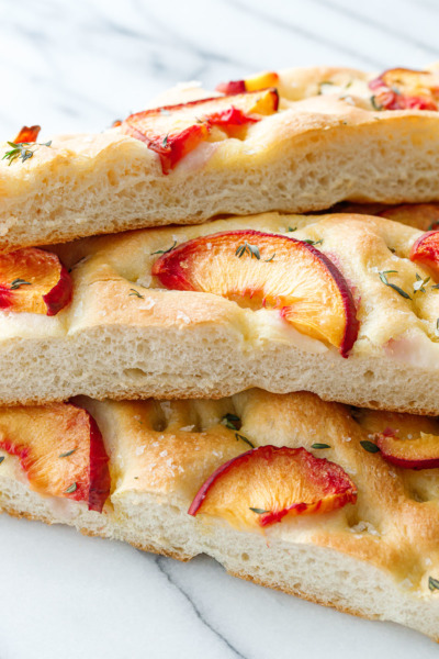 Peach & Fresh Herb Focaccia Bread cut into slices and stacked