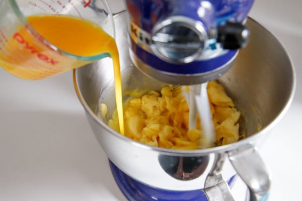 Making choux pastry dough for cream puffs - beat in the eggs one at a time.