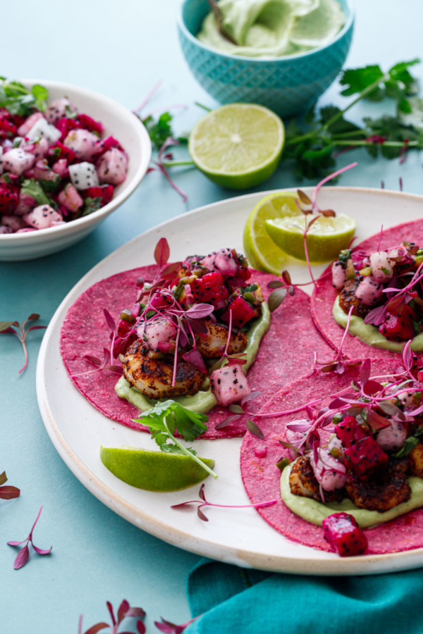 Blackened Shrimp Tacos with Dragonfruit Salsa on pink colored tortillas