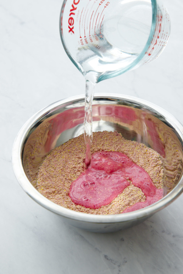 Making pink corn tortillas, colored with dragonfruit powder