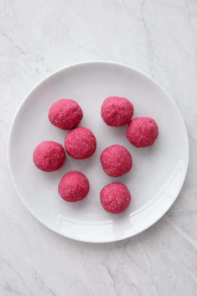 Making pink corn tortillas, colored with dragonfruit powder