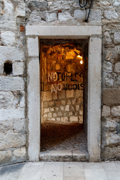 No Topless. No nudis. Doorway to a waterfront bar in Dubrovnik, Croatia.