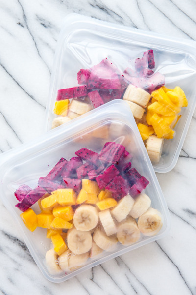 Store portioned frozen fruit in reusable silicone bags - just dump in the blender, add liquid and blend!