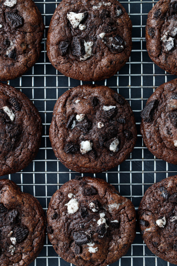 Overhead shot of Cream-Stuffed Chocolate Cookies 'n Cream Cookies on a wire cooling rack