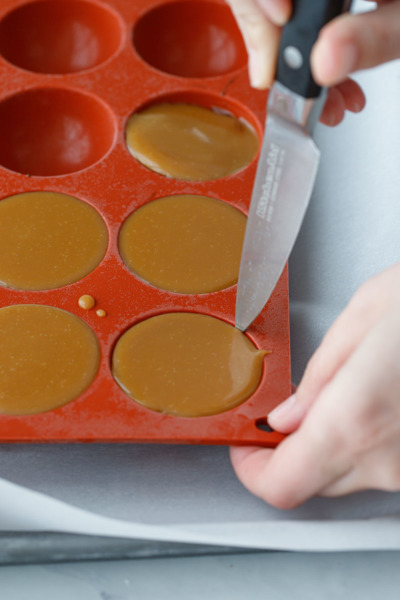 How-To Entremet Cake Process: run a knife around the edge of the caramel to release it from the mold.