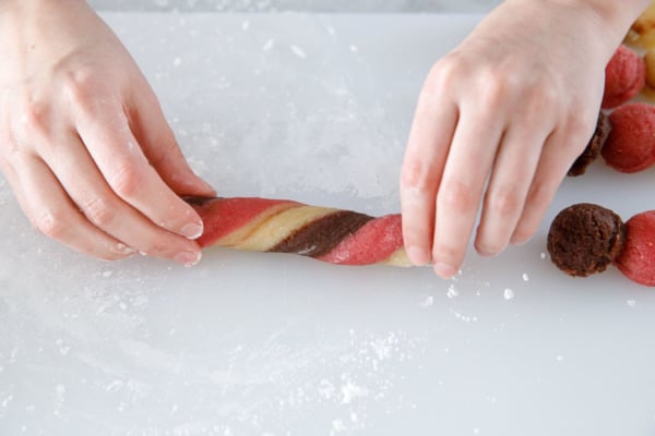 Twist the log of dough to marble the three colors even more.