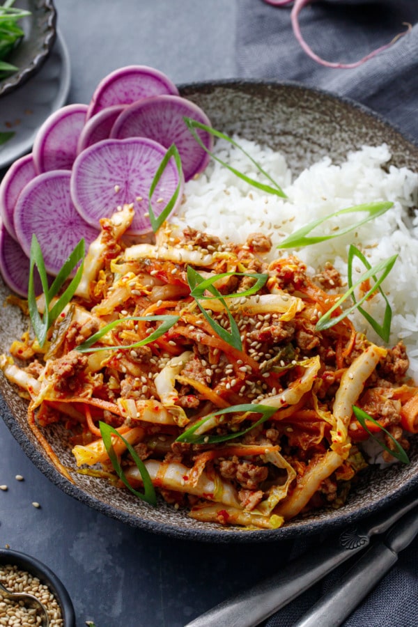 Closeup of Spicy Korean Egg Roll Bowls with rice and thinly sliced green onion