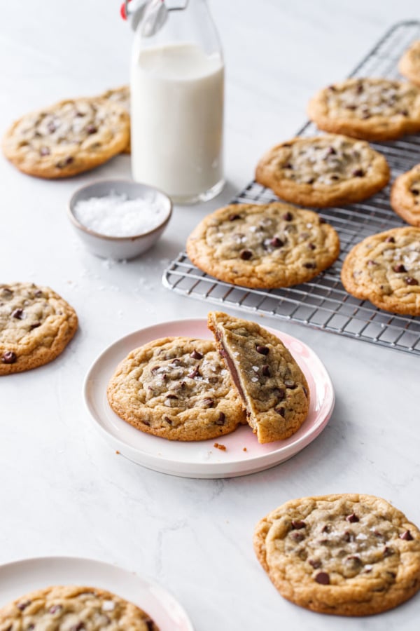 Ganache-Stuffed Chocolate Chip Cookies on a white marble background