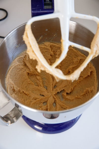 The proper consistency of the batter after mixing for 3-5 minutes.