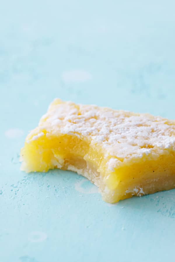 Closeup of Meyer Lemon Bar with a bite taken out of it