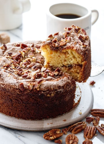 Lifting a slice of Greek Yogurt Coffee Cake showing the texture inside