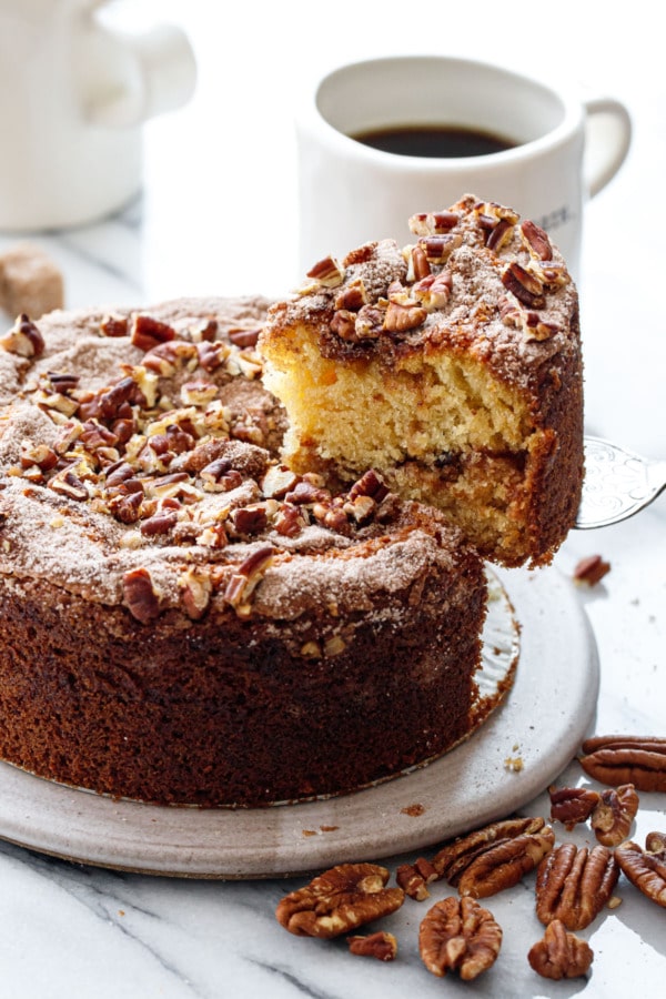 Lifting a slice of Greek Yogurt Coffee Cake showing the texture inside