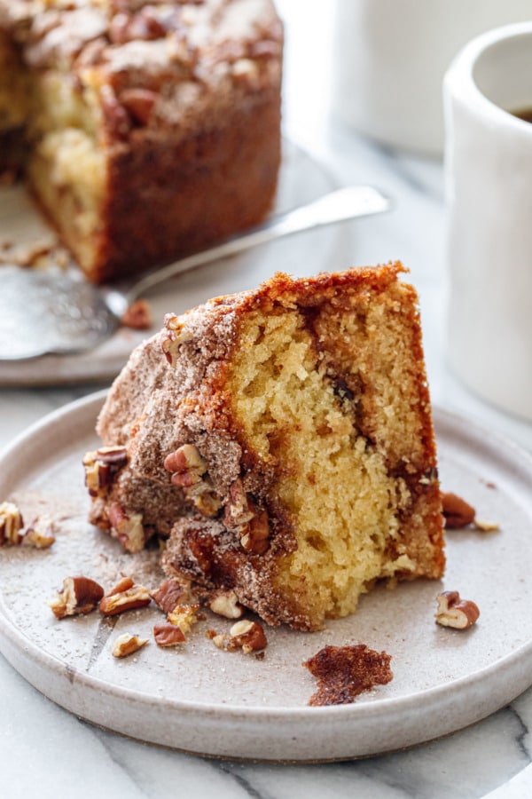 Closeup of a slice of coffee cake showing the texture and the cinnamon sugar swirl