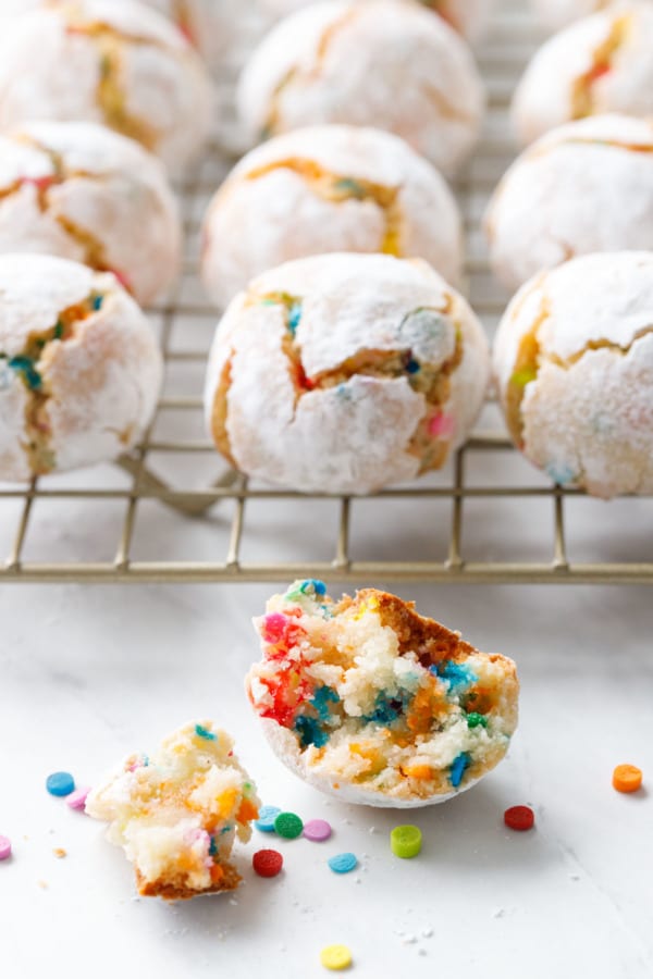 Closeup of inside of an amaretti cookie baked with rainbow sprinkles