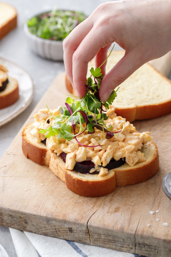 Adding microgreens to the sandwich