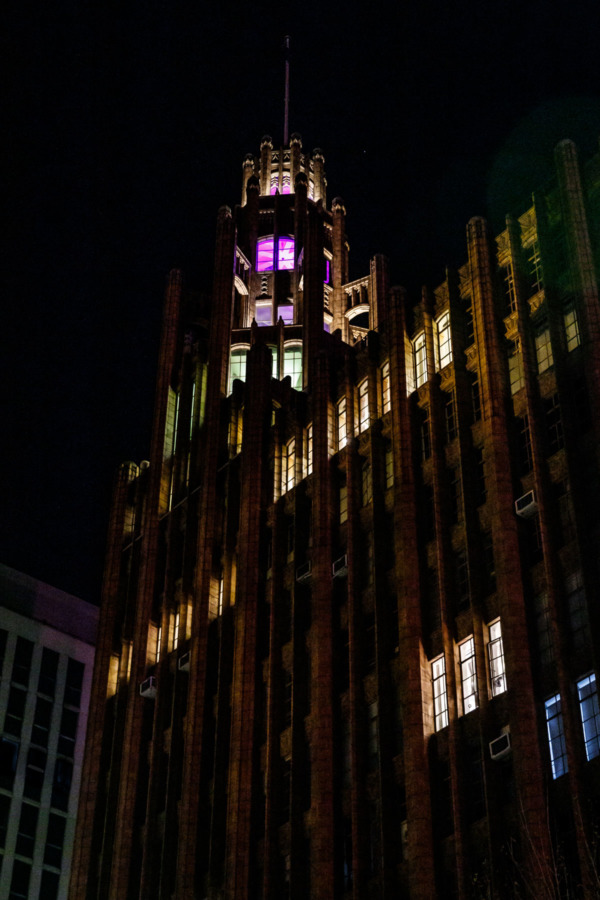 Art Deco building with colorful accent lights at night, Melbourne, Australia