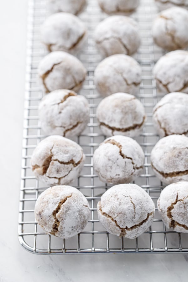 Neat rows of Hazelnut Amaretti Cookies on a wire cooling rack