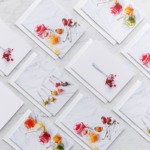 Flatlay Jam greeting cards on a marble background