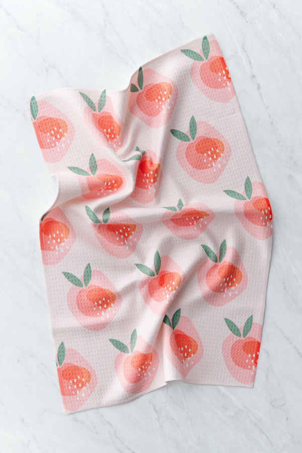 Peachy pattern dishtowel on a marble background