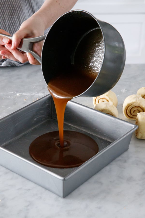 Pouring the spiced caramel topping into the pan