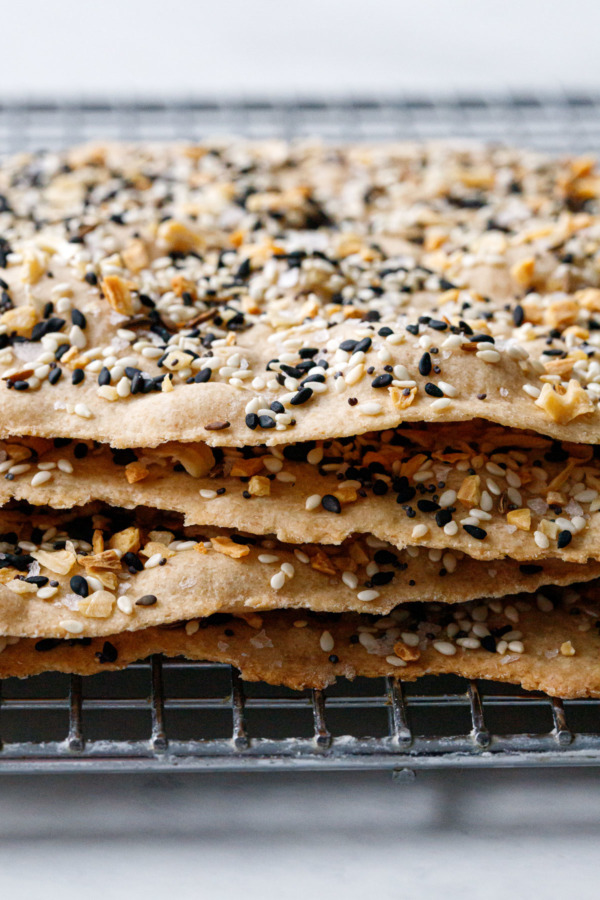 Closeup edges of Homemade Everything Crackers on a wire rack