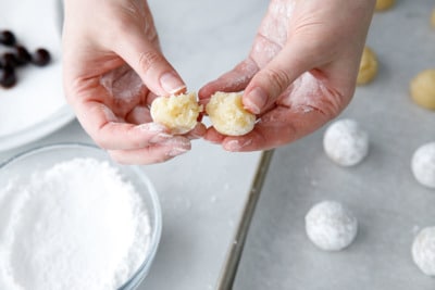 Step 1: Split each ball of dough in half.