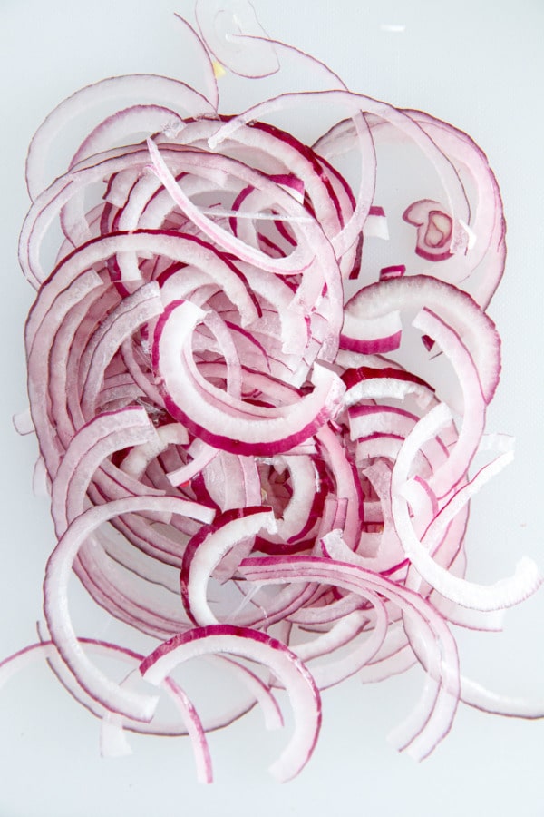 How to cut red onions into thin half-circle slices for pickling