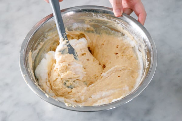 Folding the egg whites into the waffle batter