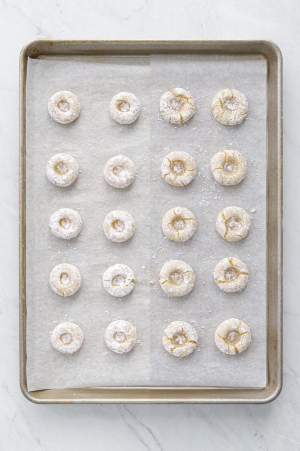 Split screen, amaretti thumbprint cookies before and after baking