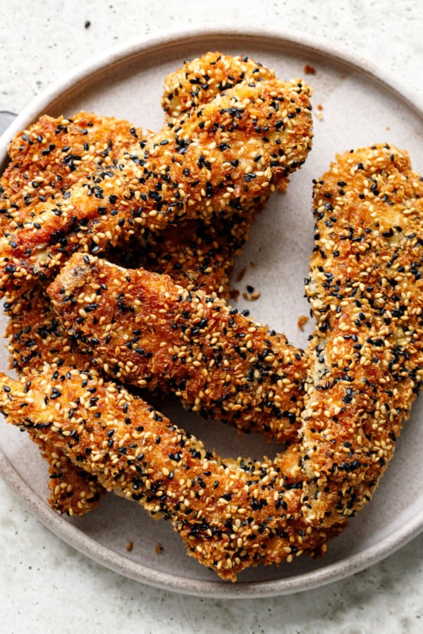 Plate with scattered Panko Sesame Chicken Tenders