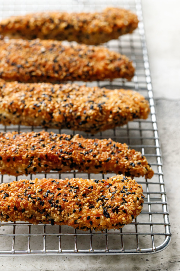 Wire rack with row of Panko Sesame Chicken Tenders